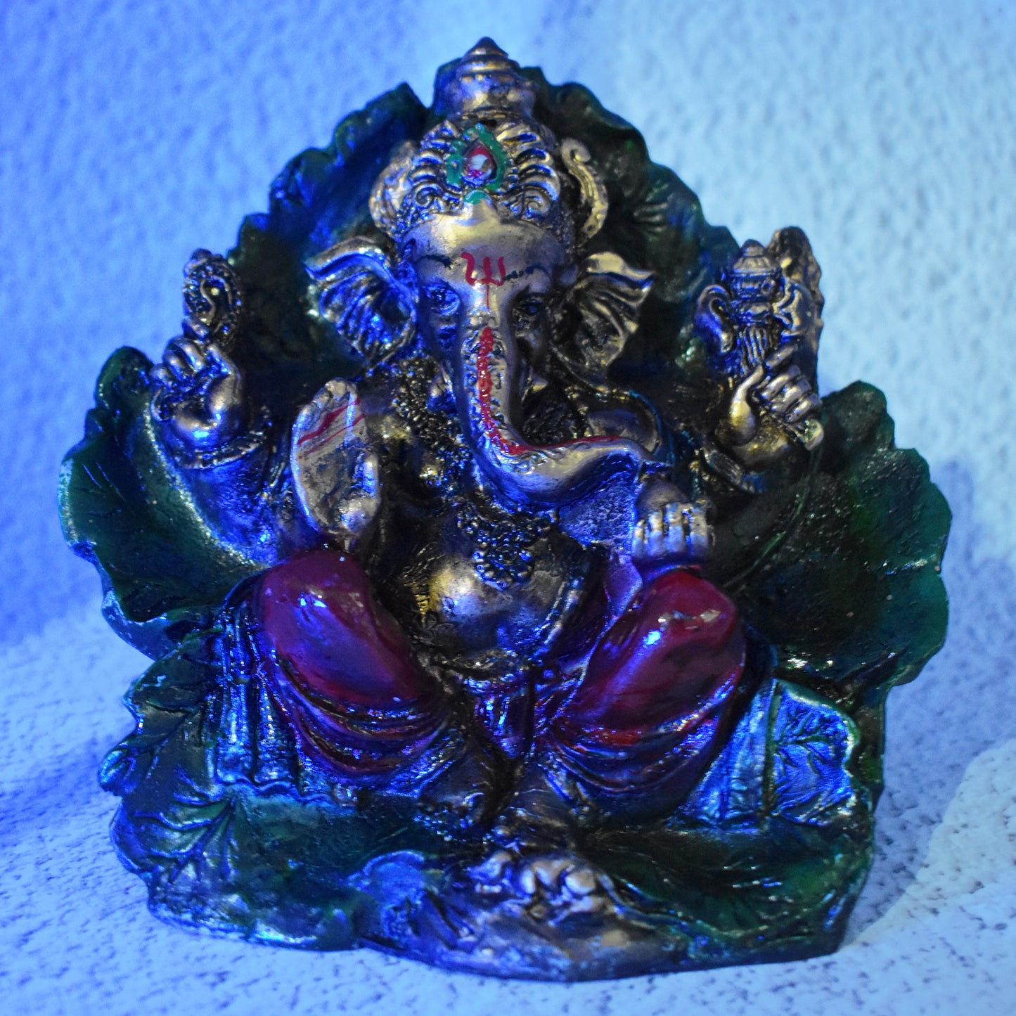 LORD GANESH JI SITTING ON LEAF MURTI (17 CM HEIGHT)